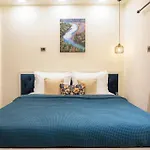 Grey Hues With Swimming Pool & Lawn At Karjat By Stayvista
