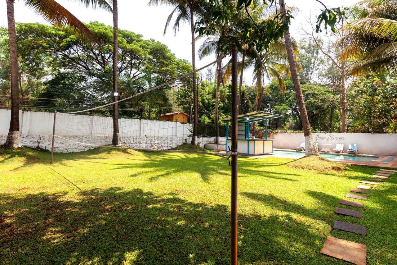 Stayvista's Casa Blanca - Modern Elegance With A Pool, Spacious Lawn & Diverse Activities Villa