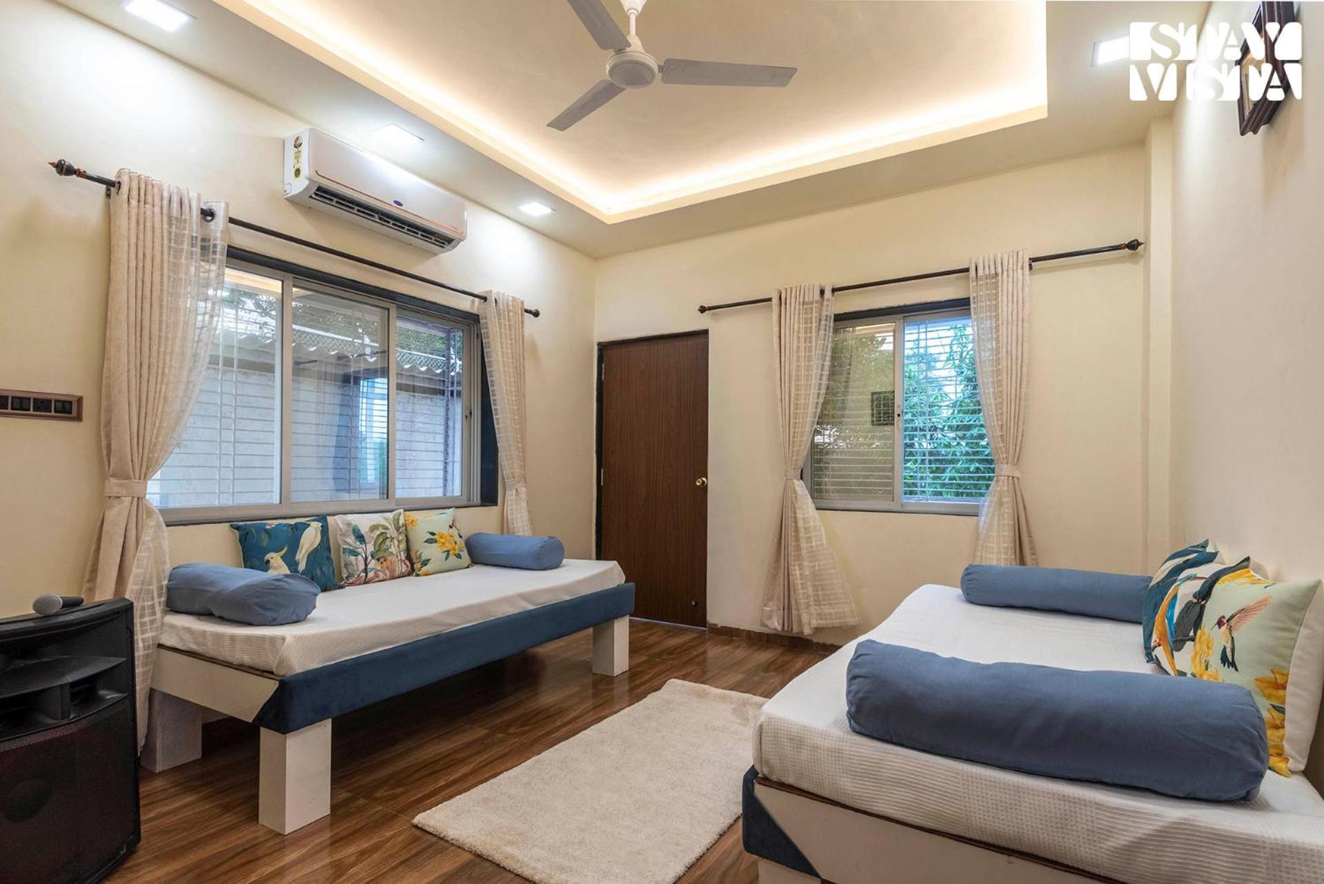 Grey Hues With Swimming Pool & Lawn At By Stayvista Villa *
