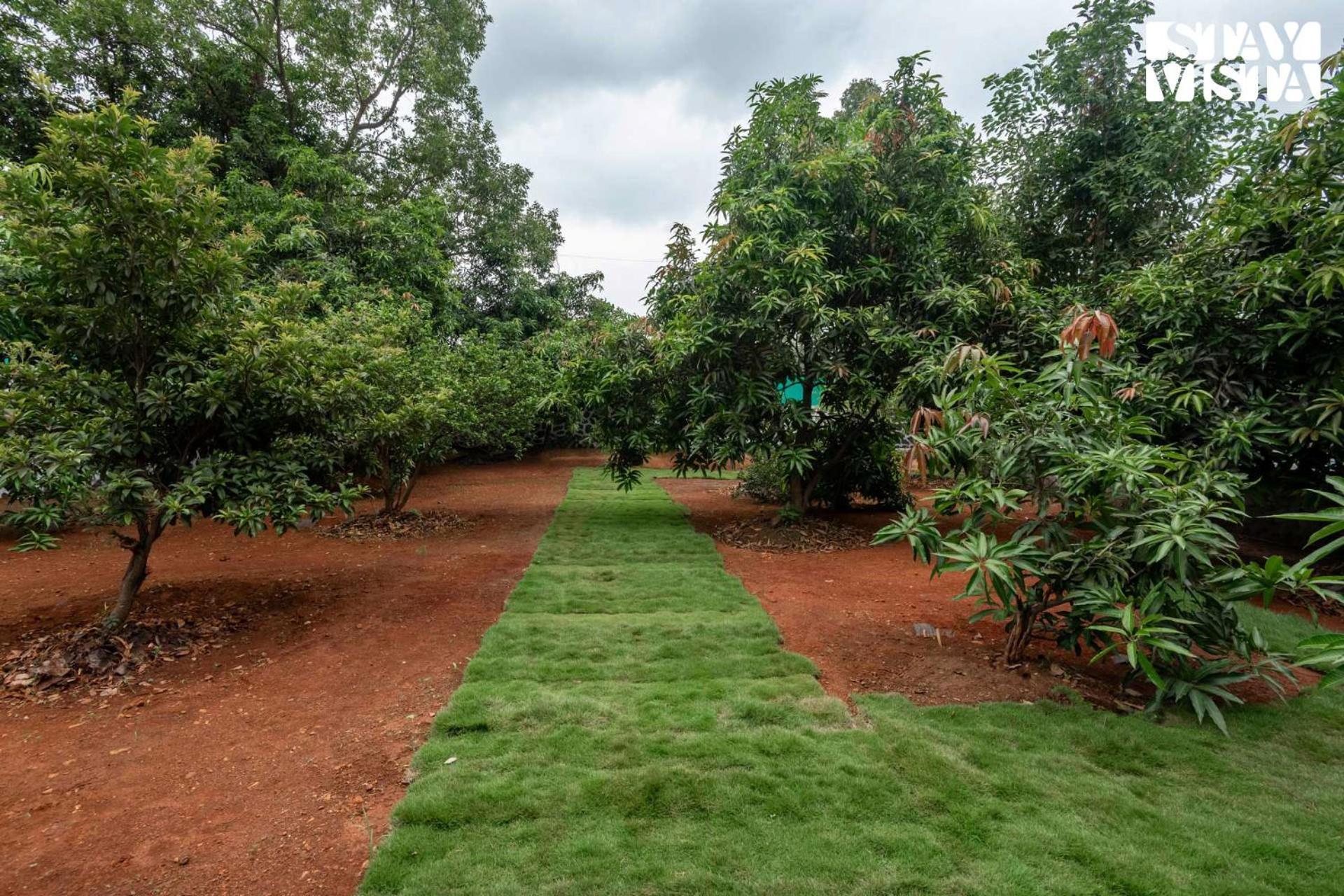 Grey Hues With Swimming Pool & Lawn At By Stayvista Villa *